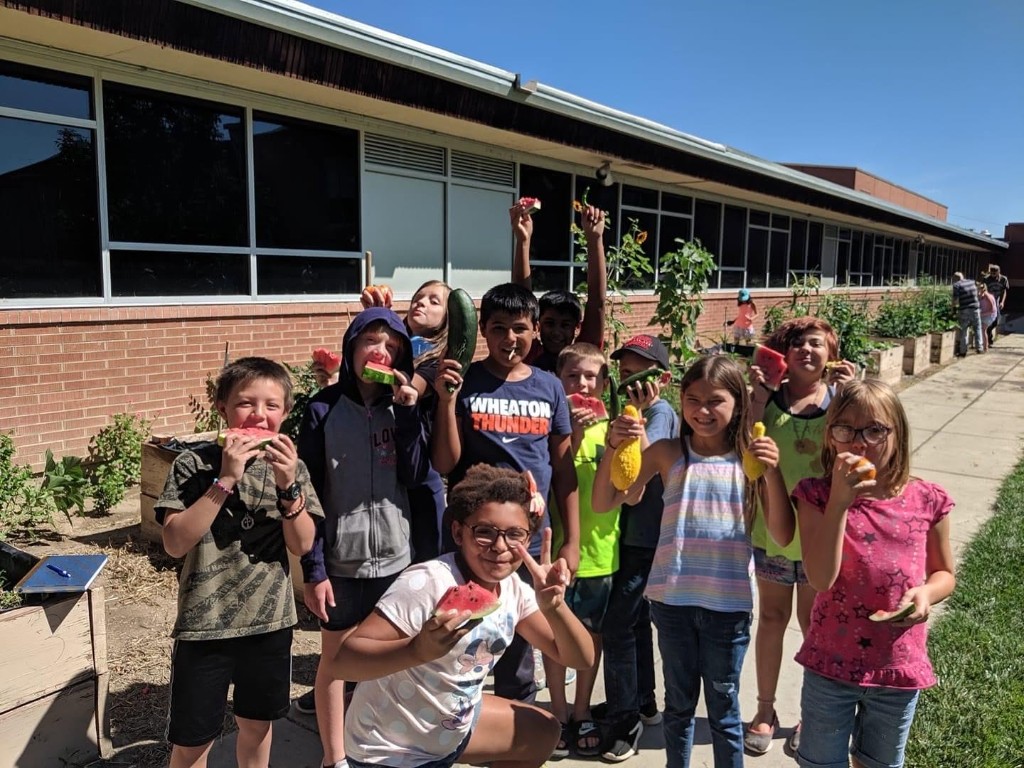 School garden harvest with Green Thumb Initiative Green Thumb Initiative students celebrating a garden harvest in Southern Colorado